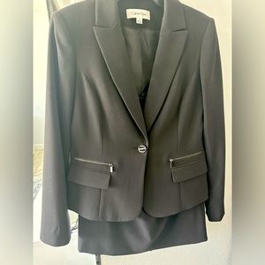 Two piece suit with pencil skirt
